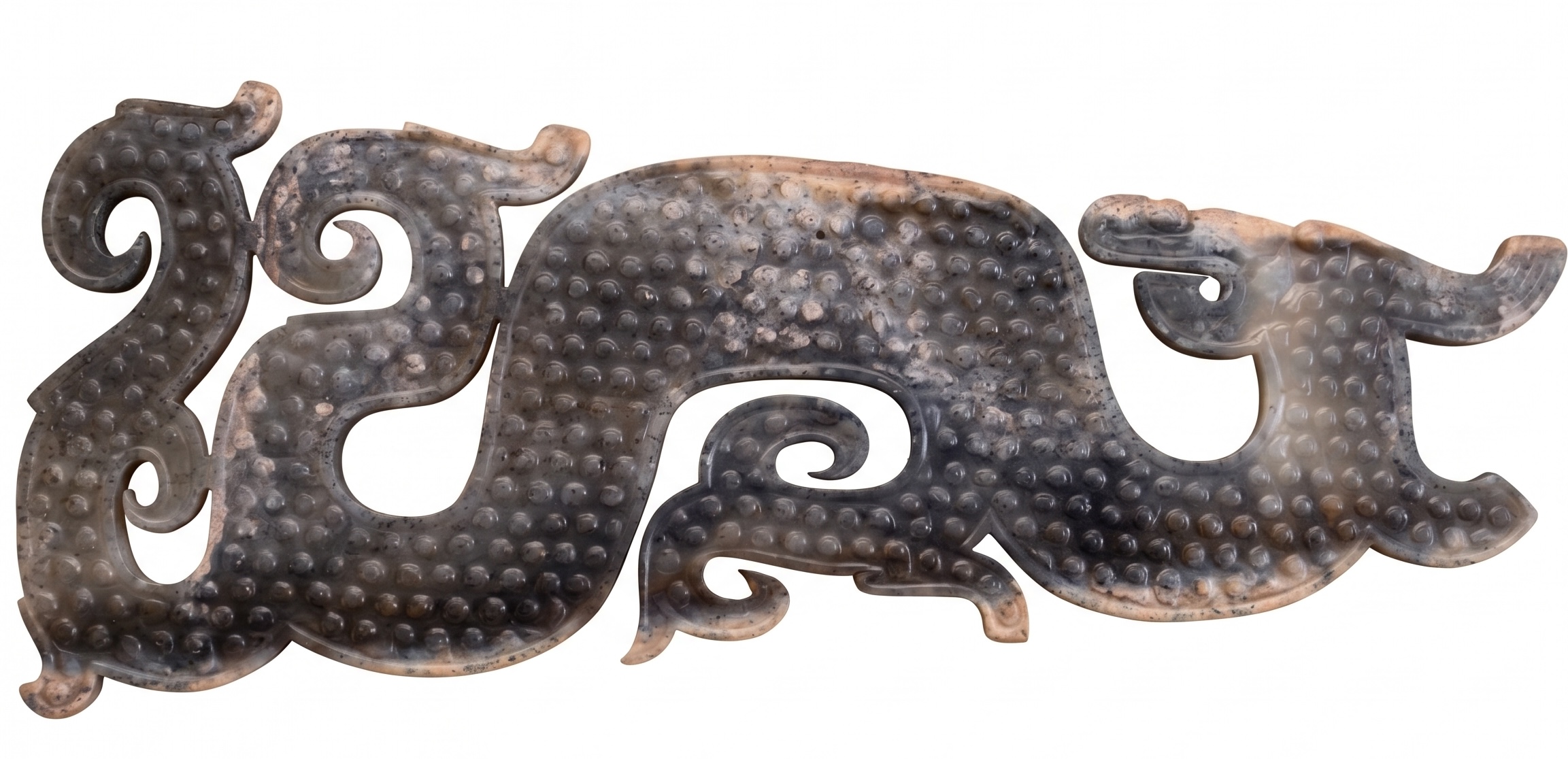 A rare and large inscribed jade ‘dragon’ plaque, Warring States period, carved with grain-spiral decoration